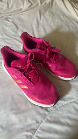 vibrant pink Adidas EQ21 Run sneakers