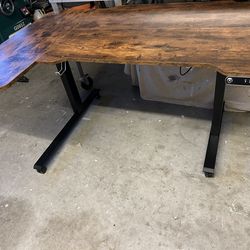 desk - height adjustable on wheels - used fair condition