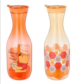 New disney winnie the pooh plastic jar with lid and 4 plastic ice cubes .. 1.6 liters .