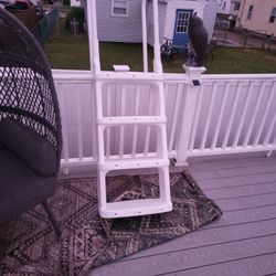 Above ground pool ladder.