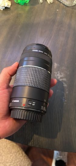 Canon EF 75–300mm f/4-5.6 III telephoto zoom lens.