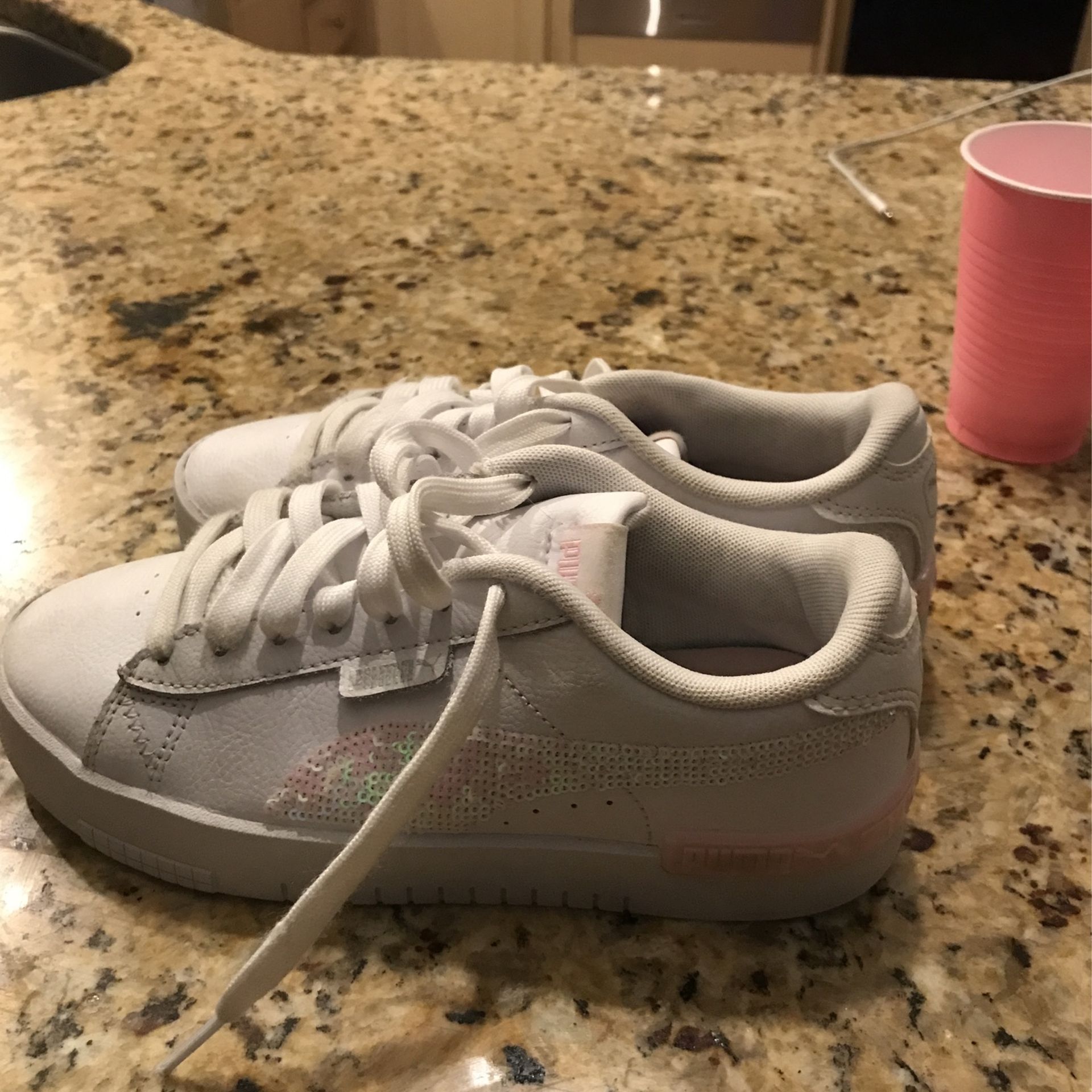 Girl Pumas Size 4c