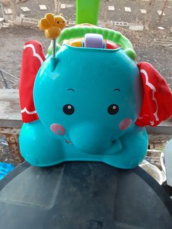 Fisher price dumbo ride/push toy gently used.