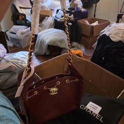 A Stunning Elegant Maroon Color Bag