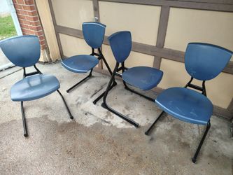 4 blue metal frame chairs