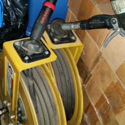 2 Graco Liquid Delivery Reels With Dispensing Nozzles 