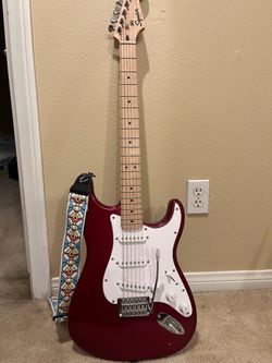 Cherry Red/Maple Neck Squier Stratocaster with Fender Strap/Carrying Bag