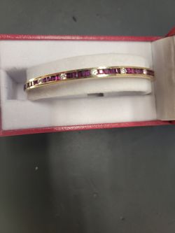 Gold 14k diamond and garnet stone
