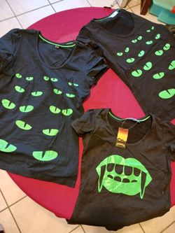 Cat eyes and fangs womens Halloween t shirts in sizes small and medium