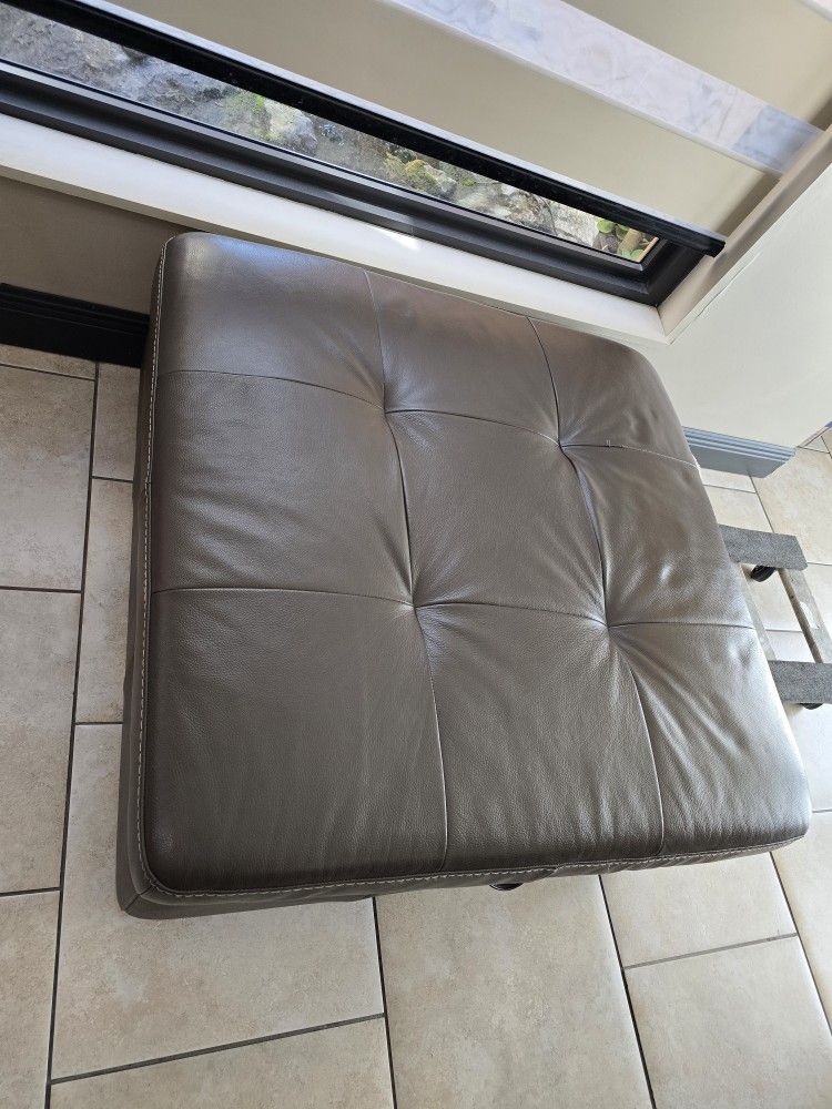 Learher Ottoman On Casters