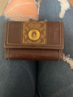 Vintage Coach Signature C canvas and brown leather snap wallet with a gold-tone 1941 medallion.