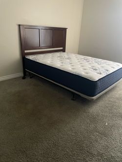 Queen bed frame with mattress and dresser