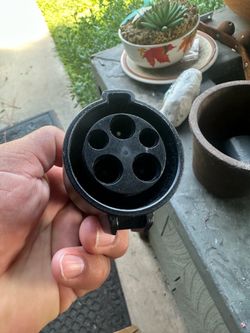 Tesla OEM SAE J1772 Charging Adapter, part number 1067348-00-C, designed to allow Tesla vehicles to use public Level 2 charging stations