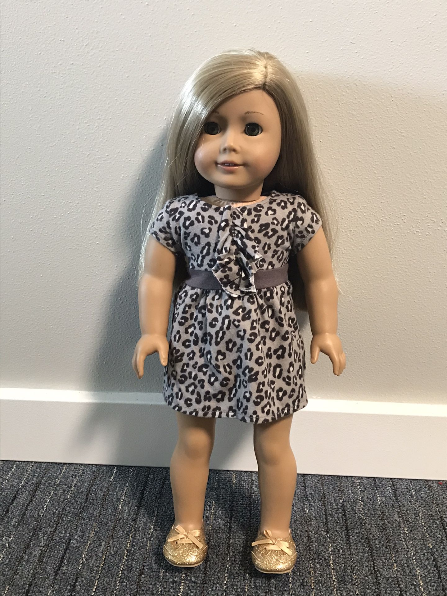 American girl doll with accessories.