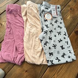 three Pairs Of Leggings, New Or Worn Once Maybe