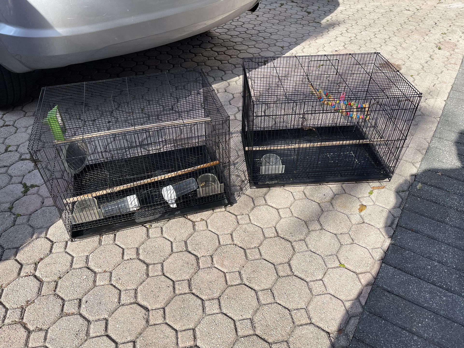 2 Bird Cages In Good Condition $20 EACH FIRM ON PRICE