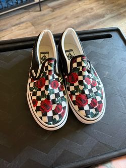 Vans slip on checkerboard roses