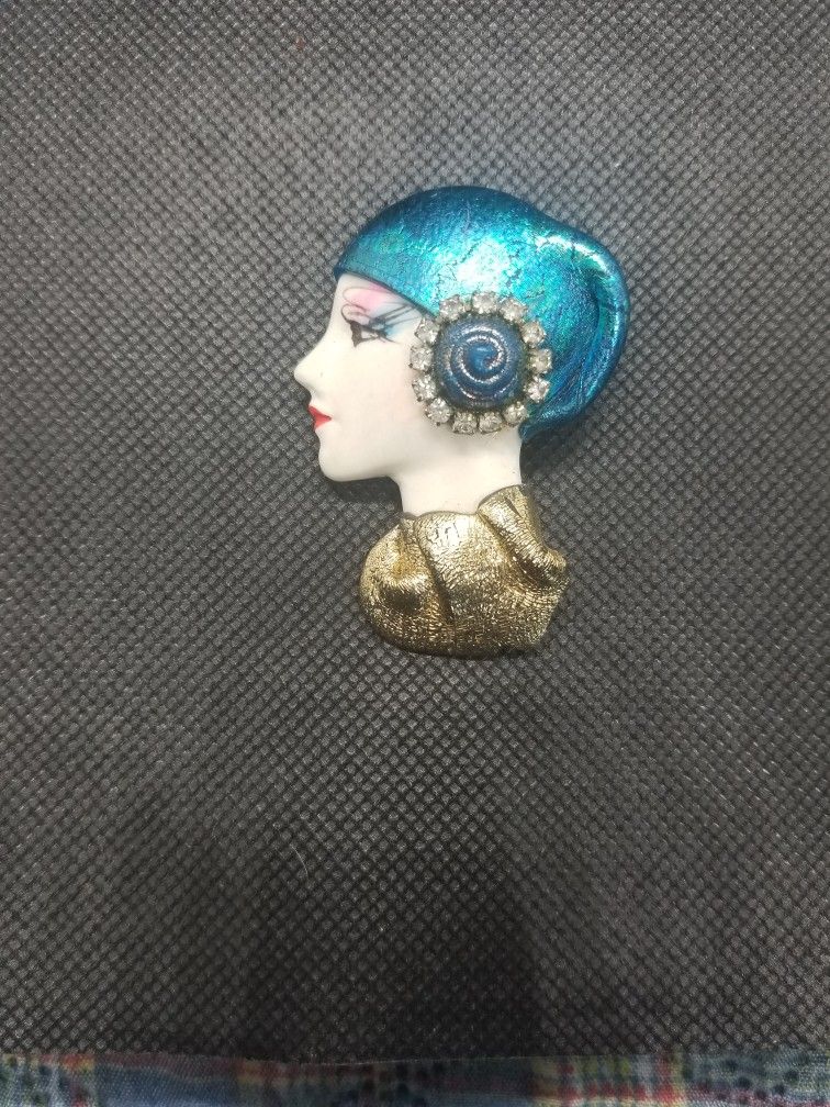 Lady With Metallic Clothing brooch