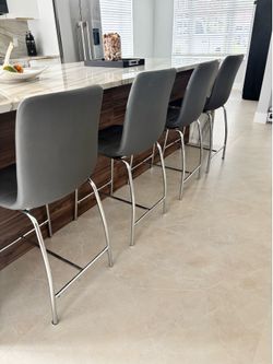 4 Barstools gray excellent condition. Delivery available