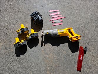 Dewalt dc385 with three batteries/charger and 20v battery adapter.