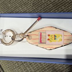 Brand new Piper K “Feeling Lucky” keychain & bag charm set in original box.
