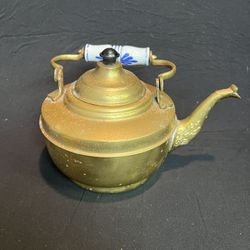 Copper tea kettle with blue and white porcelain handles