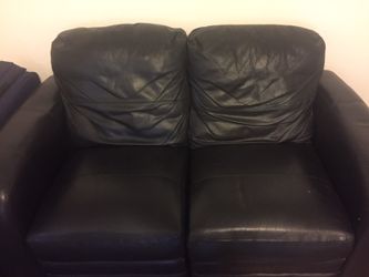 Leather love seat. Good condition. $120