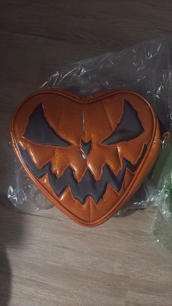 Love pain and stitches pumpkin heart bag