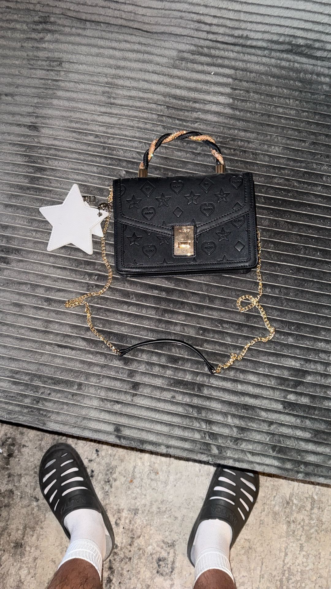 This is an ALDO Crelalleex black crossbody bag