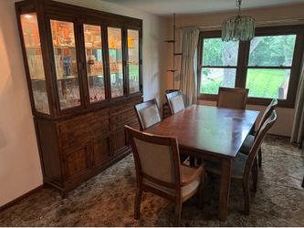 Dining set including table, chairs, hutch and cabinet
