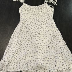 White floral mini dress with adjustable straps size medium 