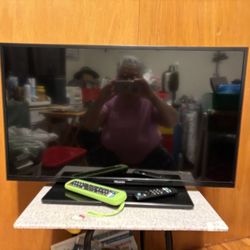 TV STAND WITH  HISENSE 35”