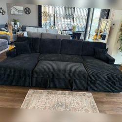 Black jumbo corduroy sectional sleeper sofa with pull out bed 