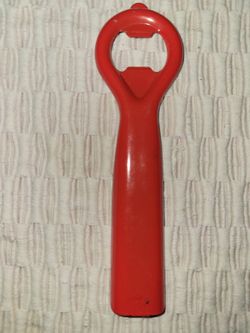 Red vintage beer bottle can opener