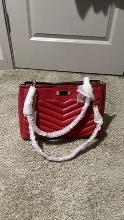 michel khors red purse