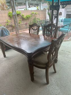 Dining table and four chairs