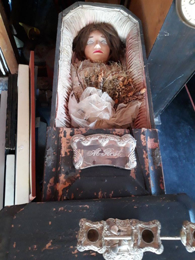 Vintage Mini 5 foot coffin with doll and candelabra