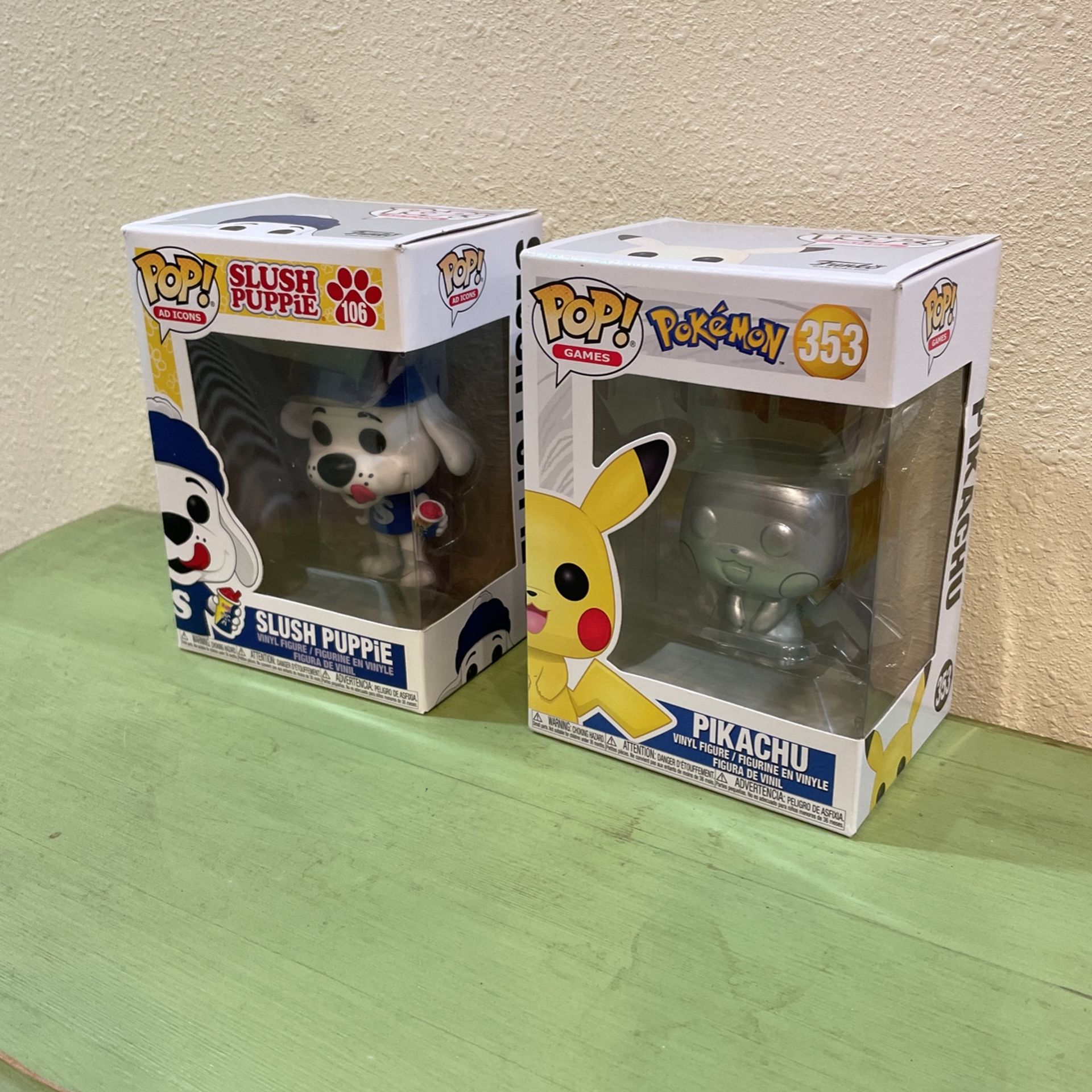 Silver, Pikachu ,& . Slush Puppy, Funko Pop $20 Take Them Both.
