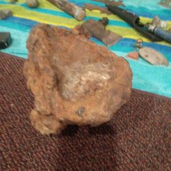 Red Magnetic Rock, With Green Or Blk Stones Sticking Out