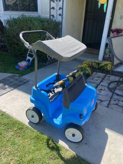Blue little tikes double push car
