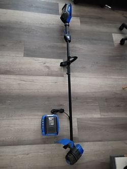 Kobalt weed cutter with charger unit