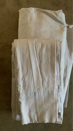 Grey bed sheet and pillowcases