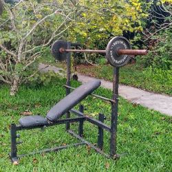   USED FLAT TO INCLINE BENCH PRESS BENCH WITH  7 FOOT / 35 LB. BARBELL BAR & 75 LBS. OF OLYMPIC PLATES  (PAIRS)  :  25s   &  2.5s  +  (4)   5s  