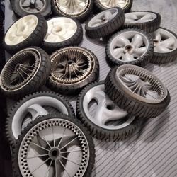 Sets Of Wheels For Lawn Mowers $40 Each Set Or $20 Each Door