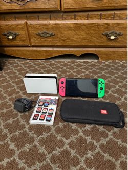 Nintendo Switch OLED Console Bundle – 8 Games Included