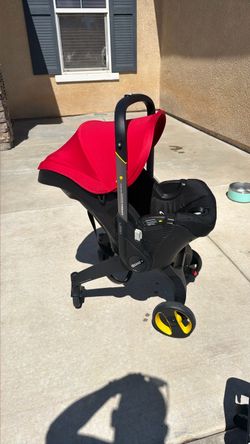 Doona Car Seat & Stroller, RED COLOR  - All-in-One Travel System