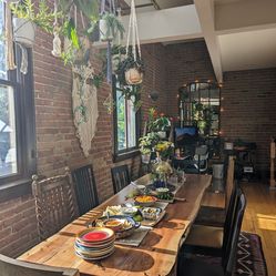 Live edge wood dining table and 8 chairs