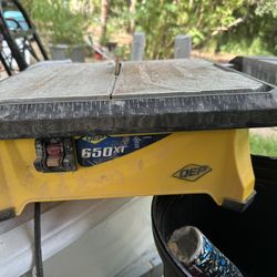 Wet Tile Saw And Rolling Knee Pads 