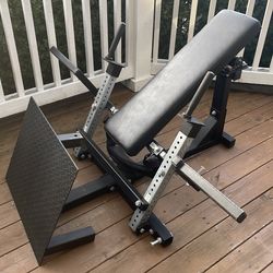 Plate loaded glute bridge machine