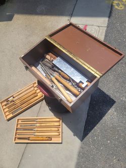 Artistic woodworking chisels and tool chest